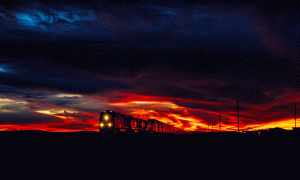 An eastbound BNSF train races by the Jack Rabbit Trading Post in Joseph City under a fiery sunset on March 22, a perfect example of the beautiful sunsets of northern Arizona.