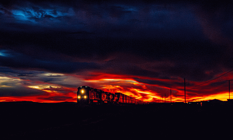 An eastbound BNSF train races by the Jack Rabbit Trading Post in Joseph City under a fiery sunset on March 22, a perfect example of the beautiful sunsets of northern Arizona.