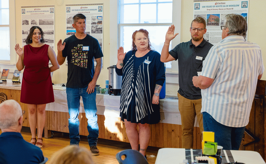 Winslow Chamber CEO Bob Hall (right) administers the oath of office to newly elected board members including (left to right) Danie Therio, Joe Perez, Jessica Atha-Cox along with re-elected member Reese Chatwin, during the chamber’s annual meeting and dinner last Friday.