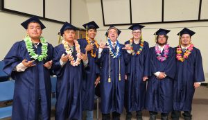 Classmates (left to right) Tatum Dixon, Jaimen Tsosie, Eli James, Cort Miller, Luke Miller, Leon Howerton and Wyatt Bowler stand together one last time as classmates before graduation.