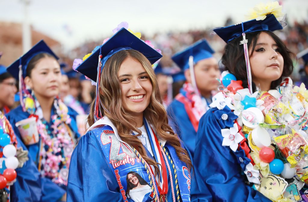 Elena Philpott prepares to walk across the stage to receive her diploma.