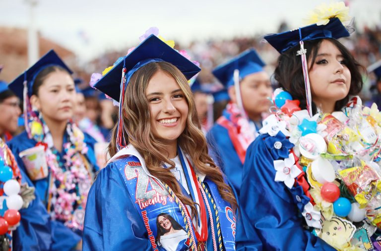 Elena Philpott prepares to walk across the stage to receive her diploma.