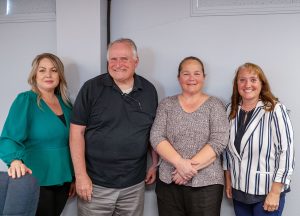 Jackie Dwyer (second from right) has been promoted to the position of city clerk and was congratulated at the last Holbrook Council meeting by (left to right) Councilmember Roxanne Pergesen, Vice Mayor Mike Nilsson and Mayor Kathleen Smith.