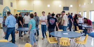 Community members gather at Joseph City Elementary School last week to learn about the next phase for Cholla Power Plant at an Arizona Public Service informational event. The gathering, which featured APS representatives and educational posters, marks the first public open house since the announcement that Cholla will be reopening as a natural gas plant, with operations anticipated to begin in 2029.