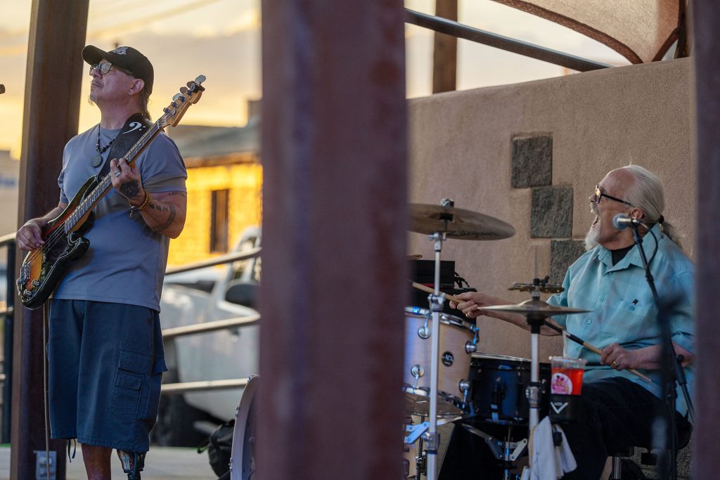 The Winslow Arts Council hosted the fifth annual FAB (Food, Arts and Blues) Festival last Saturday at Route 66 Plaza in Winslow. In photo on the left, Tony Armijo (left) on bass and Jeff Porturica (right) on drums lay down a dynamic groove. In the photo on the right, S.E. Willis (left) on keyboard and Tommy Dukes (right), Arizona Blues Hall of Famer, performed a mix of covers and original songs. The event also included food vendors and local artists showcasing their work.