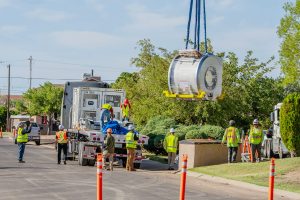A crane hoists Little Colorado Medical Center's new 30,000-pound MRI machine into its purpose-built suite at the Winslow hospital on Saturday, part of a project totaling nearly $2 million.