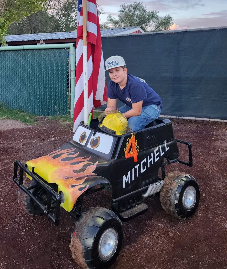 Photo by Rebecca Slade Holbrook resident Jim Mitchell took home the first-place buckle at the Power Wheels Derby during Navajo County Fair. This is the third first-place buckle for Jim, earning him a spot as a true professional in the class for 4 to 10-year-olds.