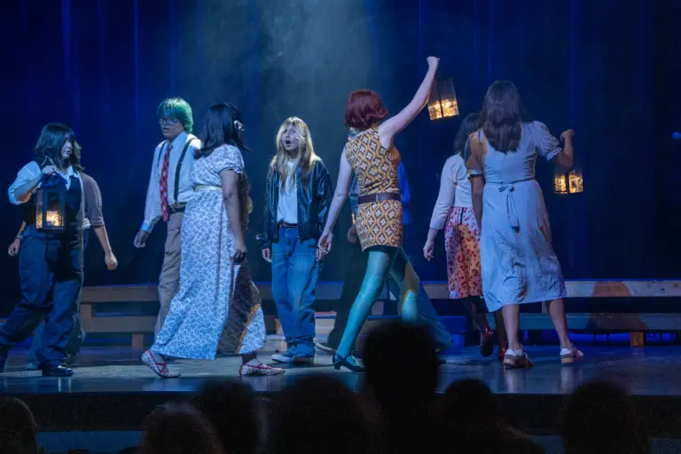The cast of “Route 66: The Mother Road” performs on stage at Winslow High School’s Performing Arts Center during the Oct. 22 opening night. The original musical marks the highway’s 100th anniversary.
