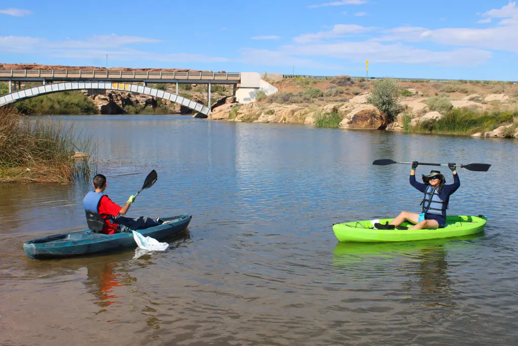 Photo courtesy of Northland Pioneer College Volunteers took to the waters of Clear Creek Reservoir armed with trash bags and enthusiasm to make a “clear” impact on the area.