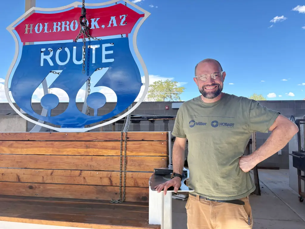 Photo courtesy of Twyla Taylor Wes King, a welding professor at Northland Pioneer College in Holbrook, is who created the Route 66 Shield featured on the wooden bench.