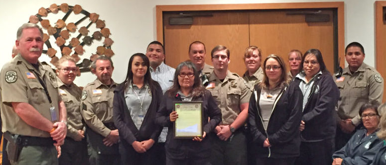 Navajo County Sheriff K.C. Clark (left), along with District III Supervisor Jason Whiting, honored detention officers during the April 26 Board of Supervisors meeting as the board approved a proclamation declaring the week of May 1-7 as Correctional Officers Week. - Photo by Adam Wolfe