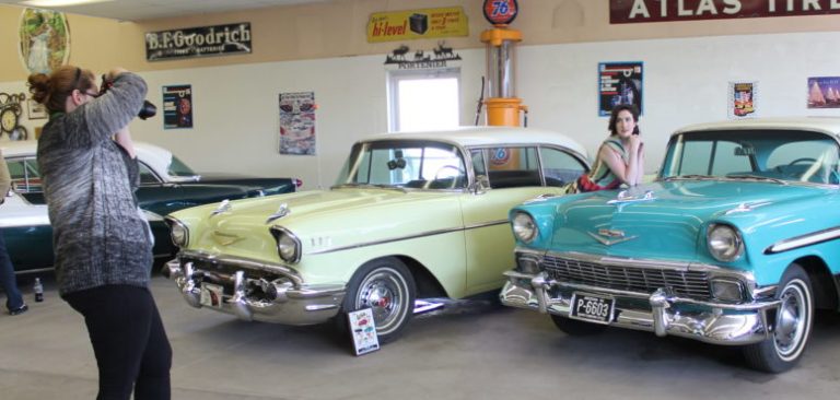 Photo by Linda KorPhotographer Mich Lundgren works with Route 66 Doll Shannon Mosier in a photo shoot at Keith Portenier’s classic car museum in Holbrook in preparation for the city’s Route 66 Festival and Gearhead Car Show scheduled on Saturday, June 11.