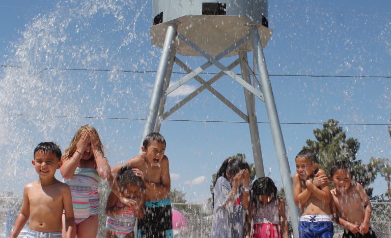Photo by Linda KorIt’s fun in the sun for kids enjoying Holbrook’s Splash Pad Park, which is now open for the summer. The park, located behind the city offices at 465 First Ave., features a batting cage, miniature golf, a bocce ball area, barbecue grills, and an area to play horseshoes and practice your golf swing. The park is open from 8 a.m. to 8 p.m., Monday through Saturday.