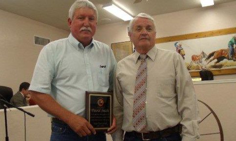 Photo by Naomi HatchFormer Taylor councilman David Smith (left) received a plaque for his service to the council and the town from Mayor Fay Hatch.