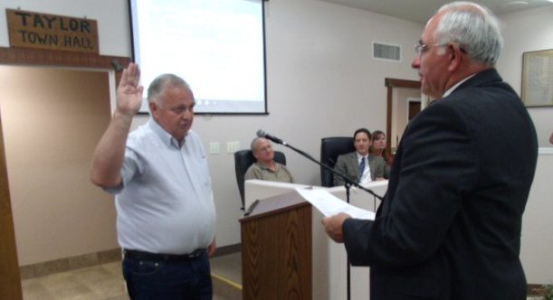 Photo by Naomi HatchMarion Hatch (left) was sworn in as a Taylor councilman last week by Judge Fred Peterson.