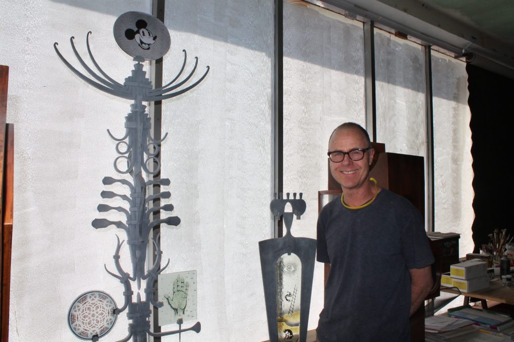 Photo by Talaina FisherArtist John Suttman stands among some of the unfinished sculptures in his developing studio.