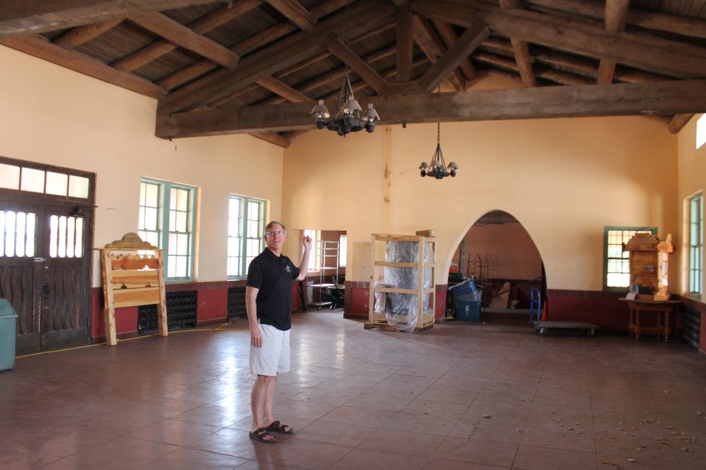 Photo by Talaina FisherAlan Affeldt points out the original lamps that are still a part of the train depot, which, like La Posada Hotel, reflects the brilliance of Mary Coulter’s architecture.