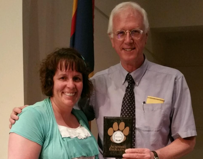 Photo courtesy of Sharon VasquezPrescott Winslow (right) was honored last May for his volunteer efforts in Sylvia Vasquez’s (left) seventh grade class. According to Vasquez, Winslow spent each day last year in her class and worked tirelessly to ensure that students could achieve their dreams.