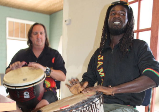 Photo by Linda KorChris Obren (left) and Calbert Brooks (right) entertain The Tribune-News staff with an upbeat and uplifting drum session. Brooks will be performing this weekend with Triple Play as part of the festivities at Wild West Days.