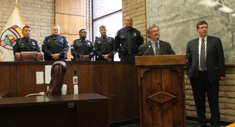 Photo by Linda KorWinslow City Manager Steve Pauken addresses the media and public during a July 22 press conference regarding the Easter Sunday shooting death of Loreal Tsingine. Standing with him are (left to right) Winslow Police Department Lt. James Sepi, Sgt. Eugene Toliver, Sgt. Quintin Hayes, Lt. Ken Arend, Police Chief Steve Garnett and Mayor Robin Boyd.