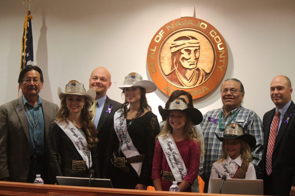 Photo by Talaina Fisher The Navajo County Rodeo Queens were crowned during the Oct. 11 meeting of the Navajo County Board of Supervisors. Those taking part in the ceremony included (left to right) Supervisor Jesse Thompson, Queen Elizabeth Siegfried, Chairman Jason Whiting, Teen Queen Lucille Vaughn, Supervisor Dawnafe Whitesinger, Princess Brooke Suter, Supervisor Robert Black, Little Buckaroo Queen Jo Dutcher and Supervisor Steve Williams.