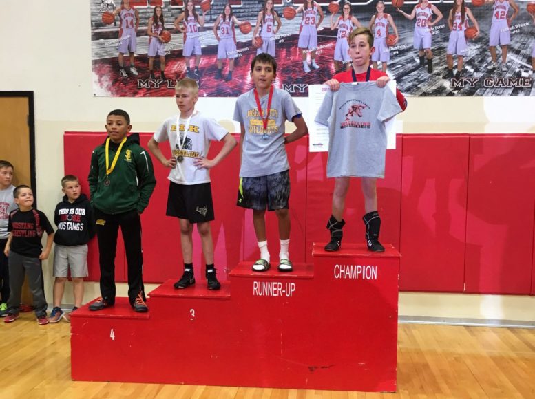 Photos courtesy of Holbrook Junior High School - Zander Phaturos (right), a seventh grader at Holbrook Junior High School, captured the 78-pound title at the White Mountain League Wrestling Championships held Dec. 3 at Mogollon High School in Heber.