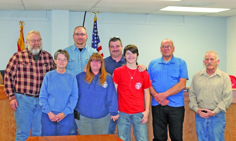 Photo by Linda KorThe Holbrook City Council ratified the appointment of Phillip Rose as chief of the Holbrook Volunteer Fire Department last week. Offering their congratulations to Rose (back row, center) are (front row, left to right) Councilwoman Francie Payne, Melinda Rose, Logan Rose, (back row) Councilman Richard Peterson, Vice Mayor Wade Carlisle, and Councilmen Earl Kester and CJ Wischmann.