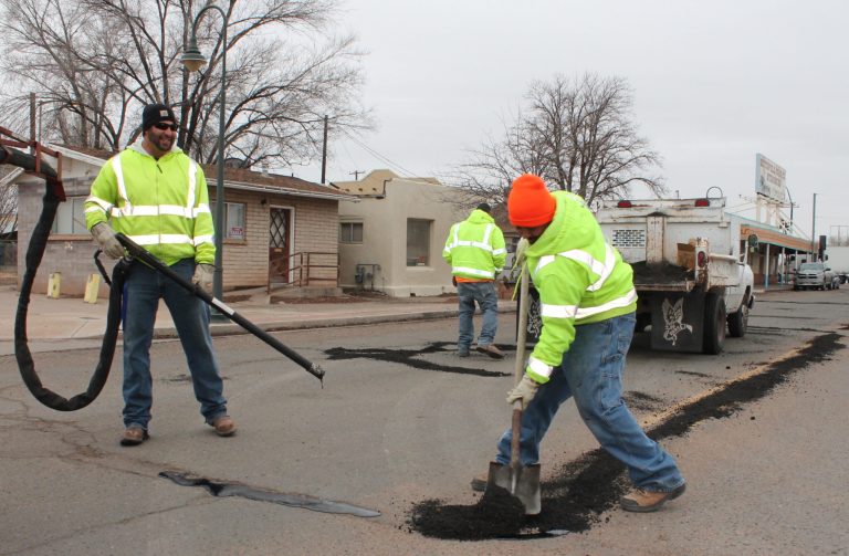Photo by Linda KorHolbrook street crews are busy with crack seal work as the chilly months of winter keep them from working with concrete. Pat Serna, Moe Serna and Oscar Chairez (left to right) found plenty to do on East Hopi Drive.