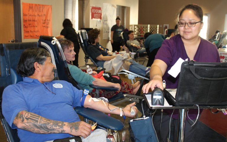 Photo by Linda KorEmployees with the City of Holbrook did their part donating blood at the Holbrook High School Student Council’s blood drive last week at the school’s gym. Water/Waste Water Supervisor Lance Spencer (left) and City Clerk Cher Reyes (center) wait patiently as Francesca Johnson with United Blood Services monitors the process. For those wanting to donate blood a blood drive will also be held at the Winslow Elks Lodge in Winslow on March 8 and 9. Visit www.bloodhero.com to make an appointment.