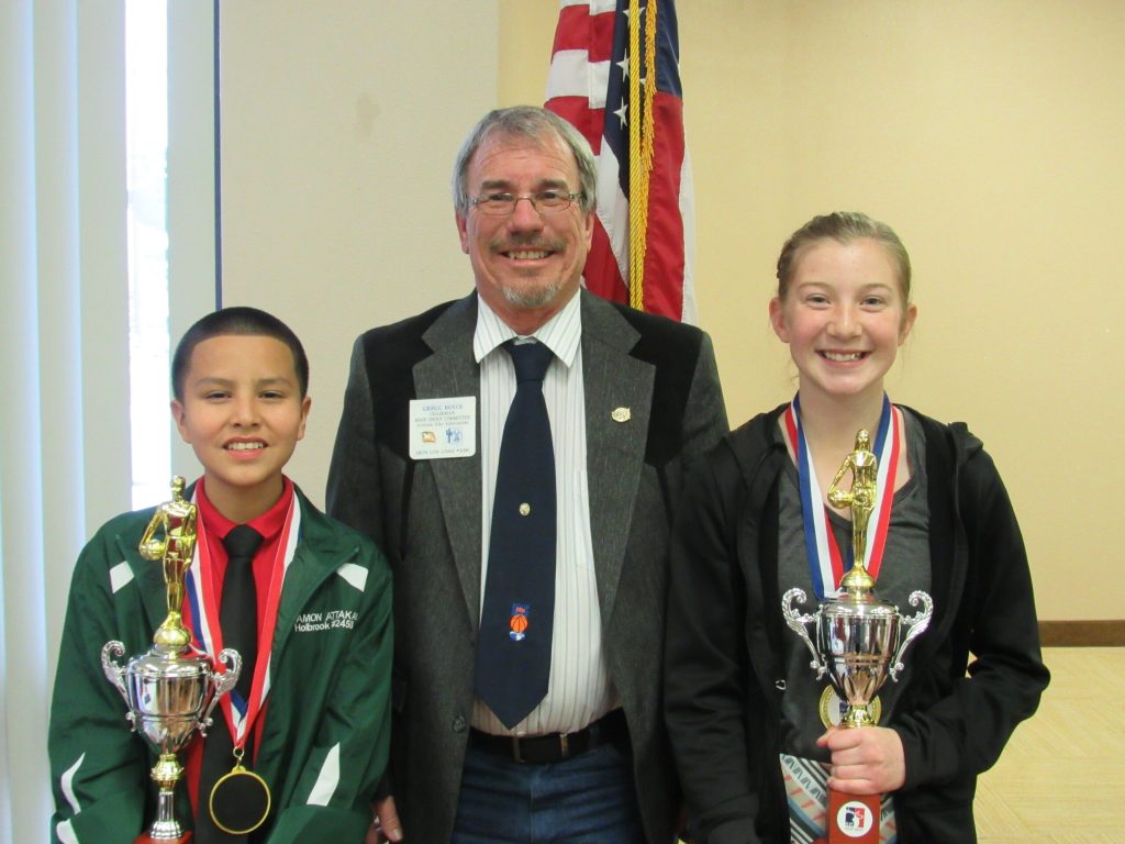 Arizona Elks Association Hoop Shoot Damon Attakai (left) and Mylee Demuth (right) came home champions after their wins at the Region 7 Regional Shoot in Las Vegas. They are pictured here with Gregg Boyce, the AEA Hoop Shoot Director.