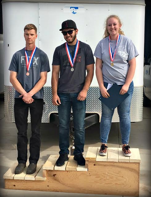Photo by Julie CliffordJoseph City High School student Kelsey Farr (right) took first place in welding at Skills Day at Northland Pioneer College’s Painted Desert Campus in Holbrook on March 3. Farr and other students enrolled in the Northern Arizona Vocational Institute of Technology participated in the event. Also pictured are Zach Harnett of Winslow High School (left) who took third place and Tyler Watson of Flagstaff School (center) who took second.