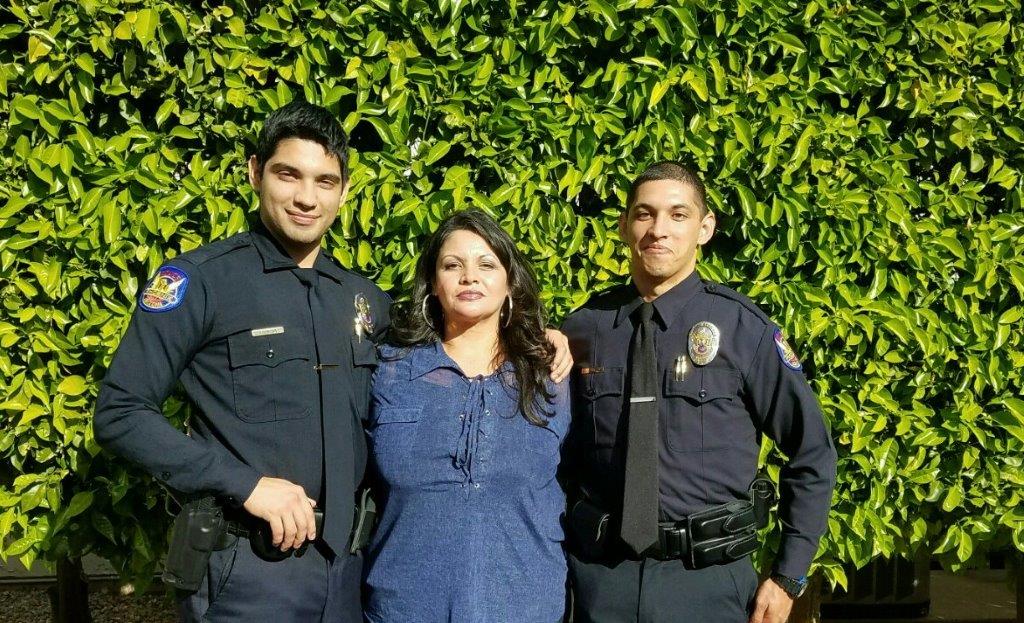 Courtesy photoHolbrook High School alumni and brothers Juan Quintana (left), class of 2009, and RJ Alvarado (right), class of 2012, recently graduated from the Phoenix Police Academy and are officers in the Phoenix Police Department. They celebrated with their mother, Nora Aguilera of Holbrook, at RJ’s March 17 graduation ceremony.
