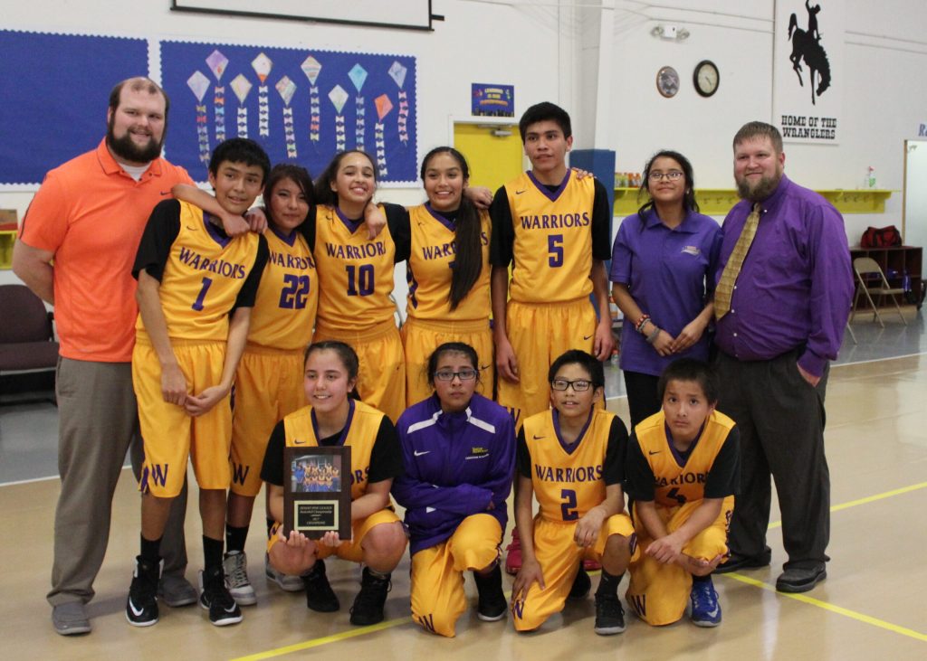 Photo courtesy of the Native American Christian AcademyThe champion Native American Christian Academy Warriors include (front row, left to right) Brianna Tsosie, Jessica Villalba, Kory Thompson, Keegan Todakozie, (back row) Coach Jonathan Mellette, Heavyn Halwood, Emmarosa Catron, Daisy Pierce, Sharadee Sands, Vann Dewey, manager Johana Secakuku and Head Coach Michael Welch.