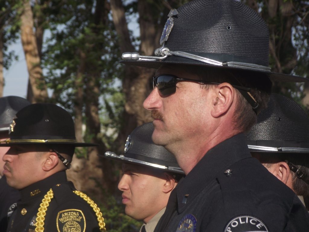 Photo by L. ParsonsLt. Ken Arend of the Winslow Police Department (foreground) was one of many officers taking part in the Police Memorial Day ceremony held last week. Agencies participating included the WPD, the Navajo County Sheriff’s Office and the Arizona Department of Public Safety.