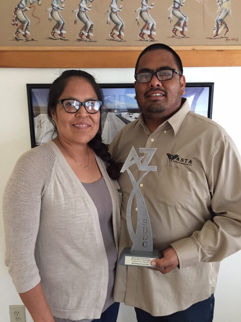 Photo courtesy of Northland Pioneer CollegeASTA Roofing and Construction in Winslow, owned by Tanya and Tim Young, won the Arizona Small Business Development Center Network’s 2017 Master Award.