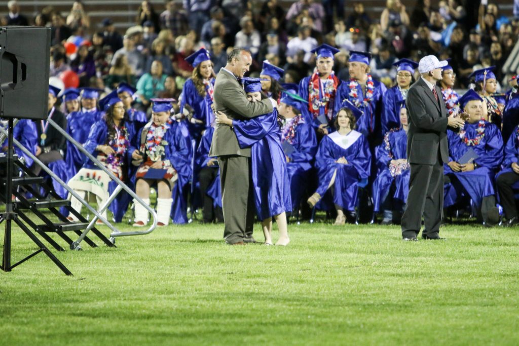 Superintendent Dr. Robbie Koerperich bids a fond farewell to Lindsey Zalenski during Holbrook High School’s commencement exercises.
