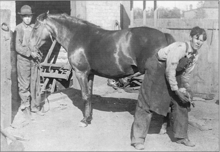 Photo courtesy of the Old Trails MuseumThe Mitchell brothers were blacksmiths who had a shop for many years at 320 E. Third St. in Winslow. They performed such tasks as tool and drill sharpening, horseshoeing, welding and automobile spring repairs. They also made most of the branding irons for local ranchers.