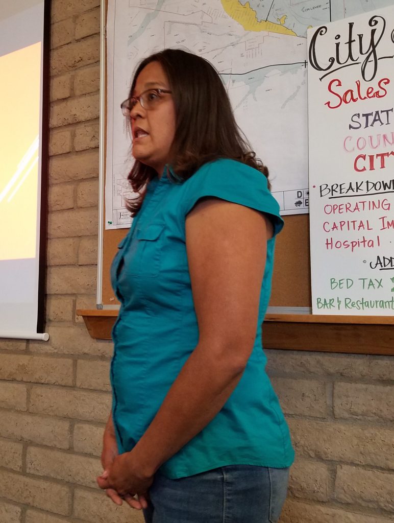 Photo by L. ParsonsJessica Stago (pictured), CEO of the Little Colorado Development Corporation, gave a presentation on the proposed Diñe Cultural and Commerce Center, which would be located at the east end of Winslow. Shown here is an artist’s rendition of what the center may look like.