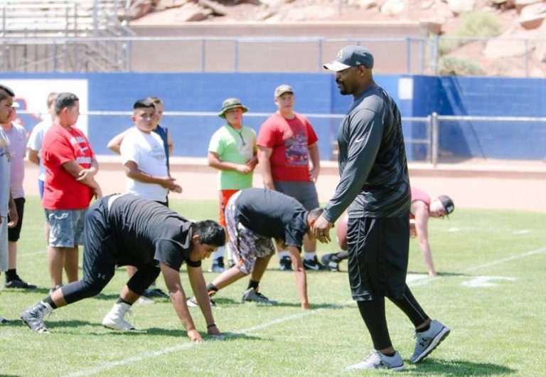 Photo by Kellie Spangler/Spanglerpics.comKids from throughout the region descended up Roadrunner Stadium in Holbrook last week to take part in a football camp. Retired Washington Redskins players Mark Mosley and Anthony Armstrong, and Arizona Cardinals players Ray Perkins, Derek Kenard, Patrick Hunter, Anthony Clement and Michael Bankston (pictured) instructed the youth from Holbrook, St. Johns, Joseph City and Chinle.