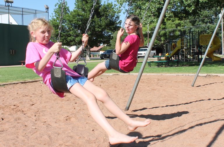 Photo by Linda KorLong, hot summer days are here and that means finding activities to keep the kids busy. These girls chose Pioneer Park in Snowflake to enjoy the afternoon with their friends and siblings. Other fun activities can be found at the Snowflake Library and through the summer recreation program offered by the Snowflake-Taylor Recreation and Parks Department.