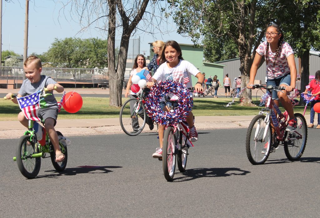 Holbrook’s annual Fourth of July kids’ parade made its way along Hunt Park with kids and adults taking part as they followed a fire engine on Florida Street on decorated bikes, trikes and on foot.