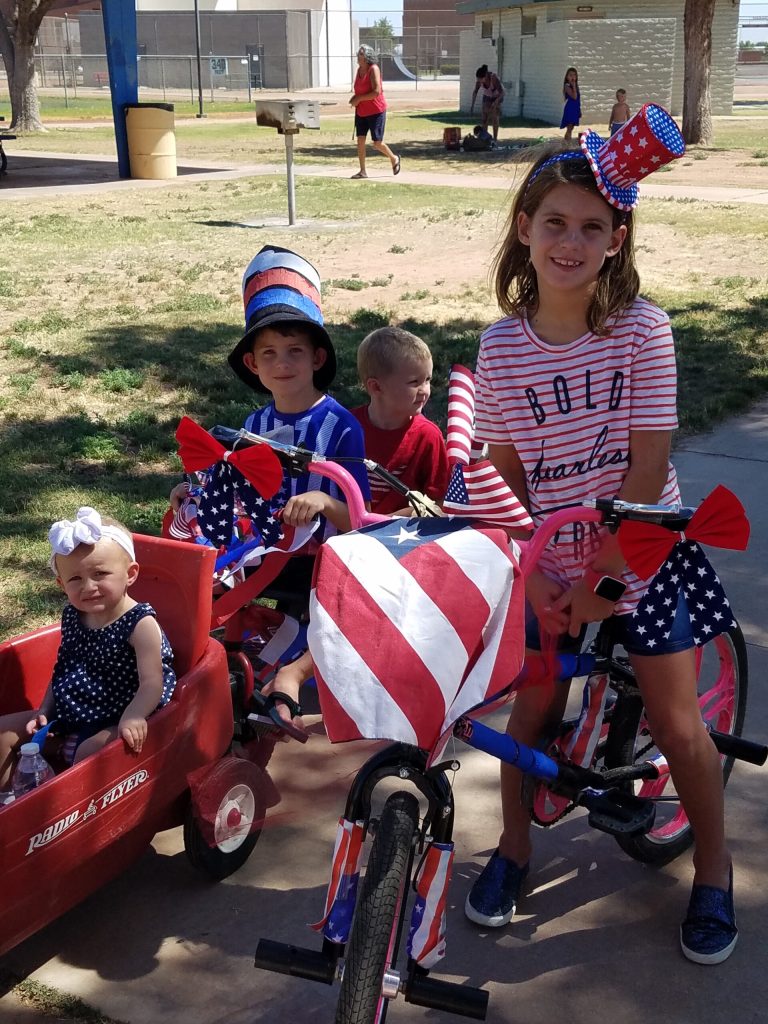 Photo by L. ParsonsRiley Richards, Tobin Henling, Callum Richards, Tatum Henling (from left to right) dressed in their patriotic best for the children's parade at the Fourth of July Freedom Festival in Winslow.