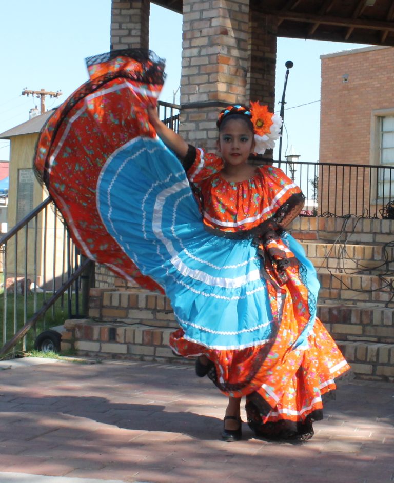 Photo by Linda KorMariaanna Enriquez is one of the many cultural dancers who performed during Wild West Day last Saturday in Holbrook. The dance group she performs with, Desierto de Colores, will also be performing from 6:30 to 8:30 p.m. on Fridays, July 21 and 28, at Gillespie Park in Holbrook.