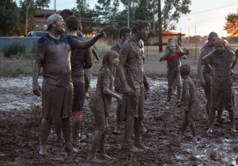 Photo by Emily Weech GardnerThe youth of the Joseph City Midway Ward enjoyed fun in the mud last week as teams were pitted against each other for mud football on the corner of Third North and Tanner Avenue. TC Fish (left) directs this play while Raylee Fish and Cameron Baldwin get their game faces on.