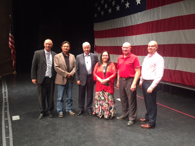 Photo courtesy of the Holbrook Unified School DistrictFormer Blue Angel, U.S. Navy Admiral and Top Gun instructor Mike McCabe (third from left) addressed teachers and staff of the Holbrook Unified School District before the school year started. Greeting McCabe are (left to right) District Superintendent Dr. Robbie Koerperich, District II Navajo County Supervisor Jesse Thompson, district governing board member Linda Yazzie, Board President Ferral Knight and District III Supervisor Jason Whiting.
