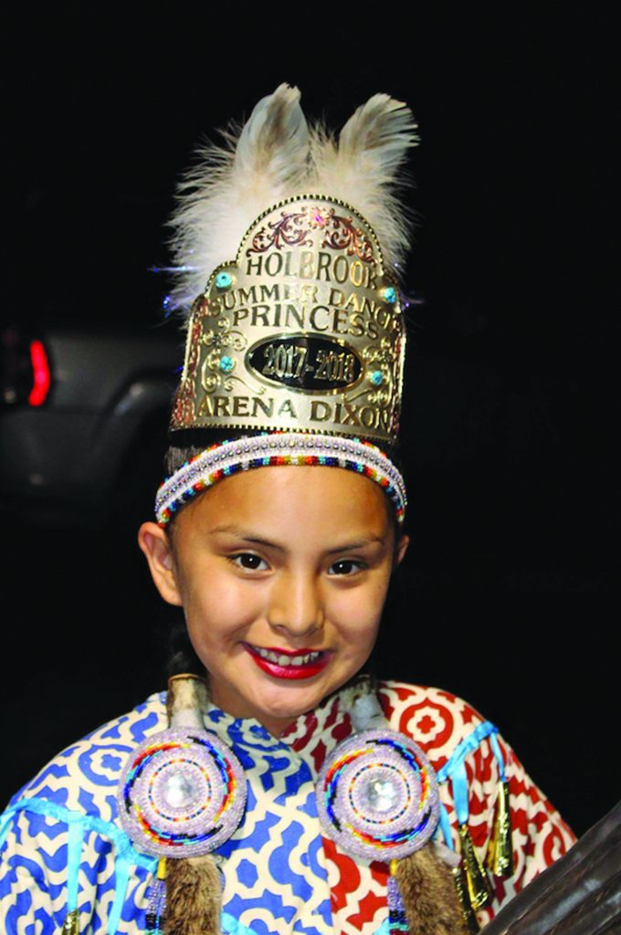 Photo courtesy of John Jimenez Arena Dixon was chosen by her peers as the 2017-18 Holbrook Summer Dance Princess. Arena is the daughter of Jennifer and Calvert Dixon of Taylor. The 10 year old is a fifth grader at Taylor Intermediate School. She will represent Holbrook at various pow-wows and events throughout the year.