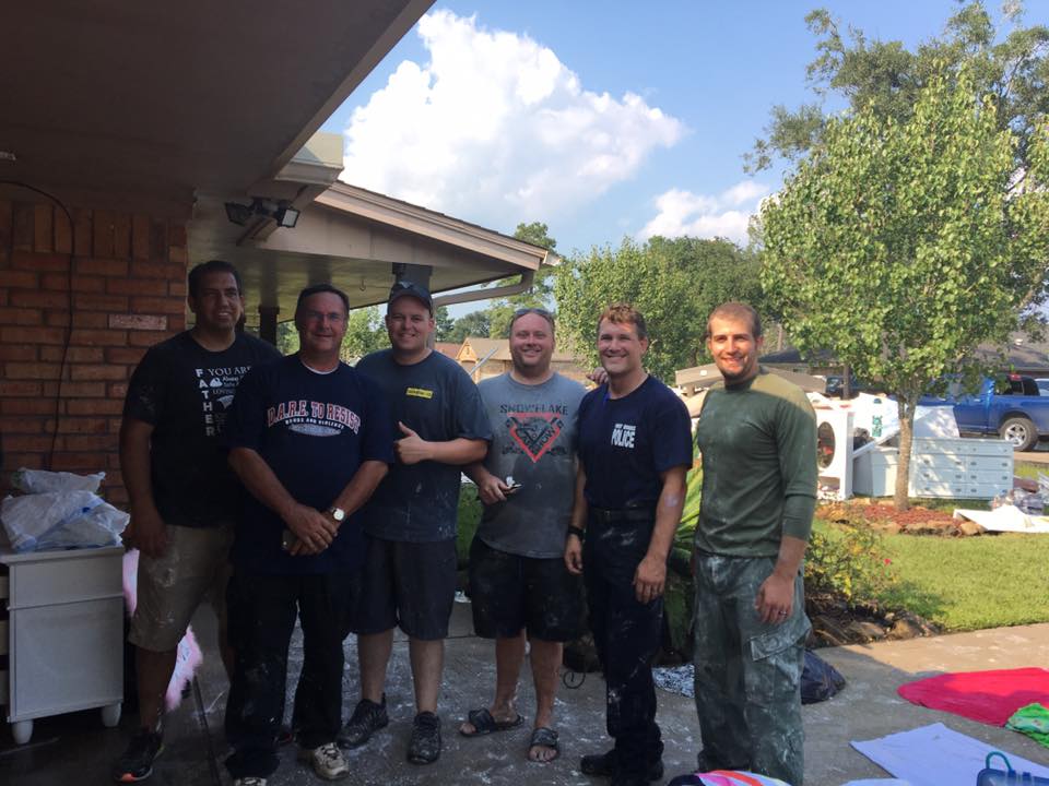 Photos courtesy of the Snowflake/Taylor Police DepartmentFive Snowflake-Taylor area men went to Texas to lend a hand to those dealing with the aftermath of Hurricane Harvey, including (top photo, left to right) Derick Ortiz, Brian Carpenter, Cristian Epps, Chase Carlson, homeowner Steven Hilton and Tanner Reidhead. Derick Ortiz (bottom left photo) picks up wood inside the Hilton home, which was damaged from the flooding. Tanner Reidhead (bottom right photo) stands in a hallway covered in dust after removing drywall damaged from waist deep flooding.