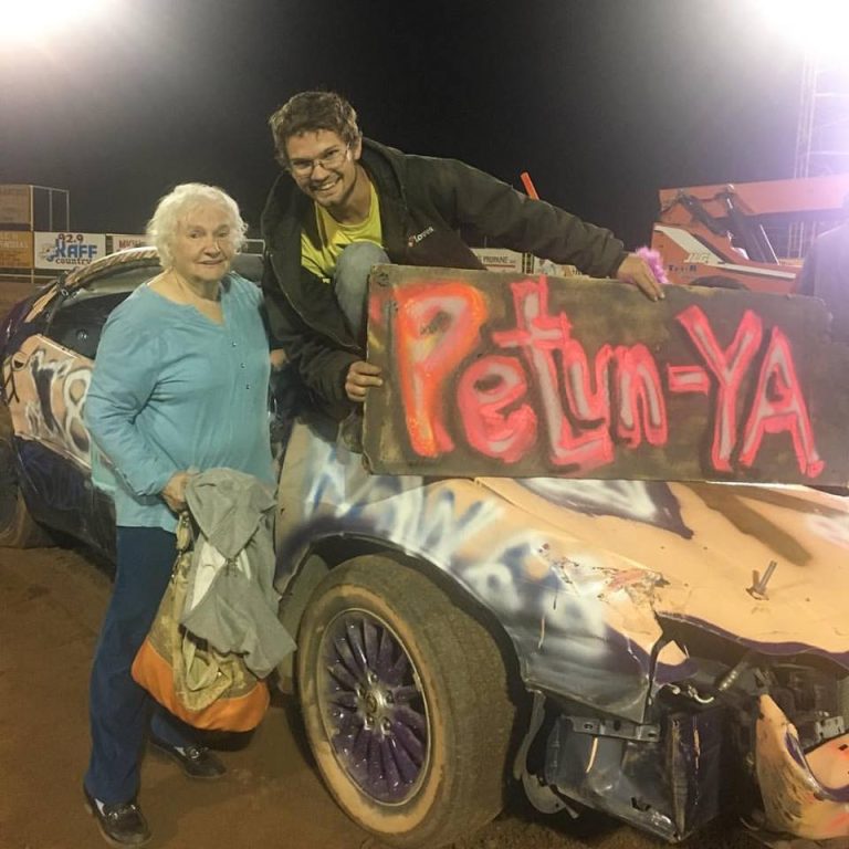 Photo by Kyle GardnerBrandon Gardner of Joseph City stands with his proud grandmother, Marie Gardner, after he and his car Petun-Ya won the Navajo County Fair Demolition Derby last Thursday night in Holbrook.
