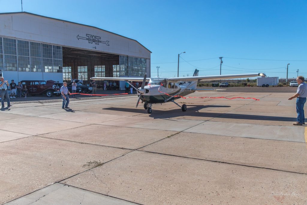 Photo by Steve PaukenWinslow celebrated its annual Fly In at the Lindbergh Regional Airport Sept. 16 with plenty of food, fun and entertainment. Pilot Orville Wiseman and his passenger Mayor Robin Boyd (inset) cut the ribbon on the new runway as part of the day’s festivities.