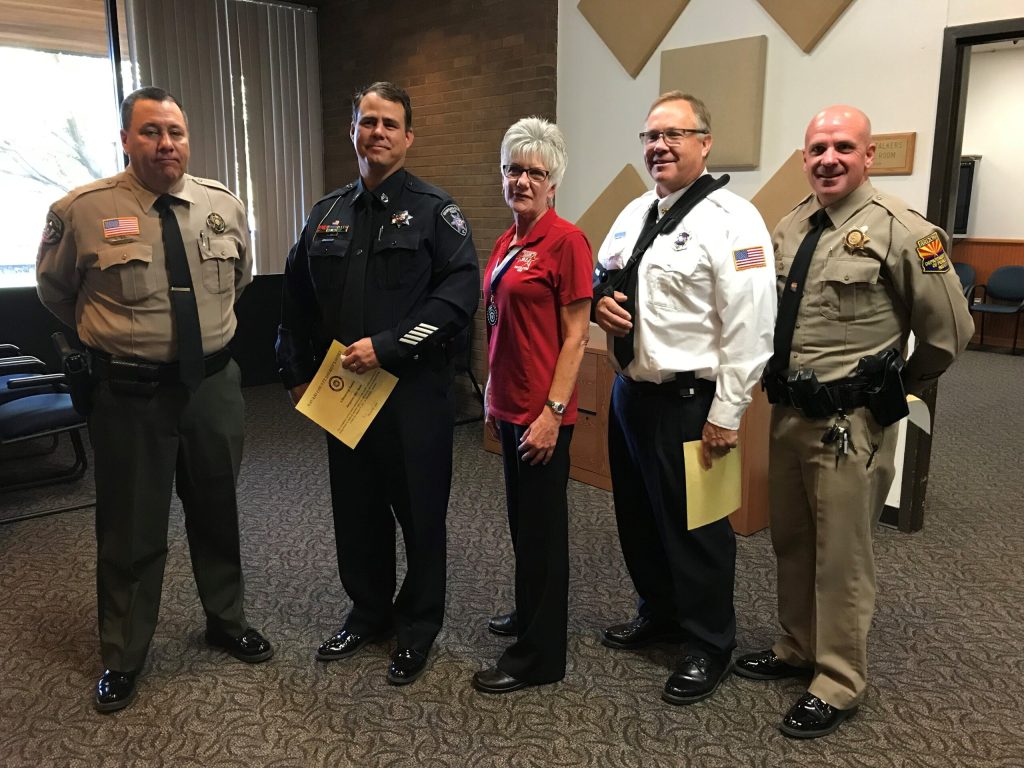 Photo courtesy of Navajo CountyAmong those first responders recognized during the Oct. 10, Board of Supervisors meeting were, (left to right) Navajo County Sheriff’s Deputy Jim Hudspeth, Snowflake Taylor Police Department Sgt. Dan Rush, STPD Dispatcher Kathleen Lockwood, Taylor-Snowflake Assistant Fire Chief Willie Nelson and Department of Public Safety Officer Russ Snipes.